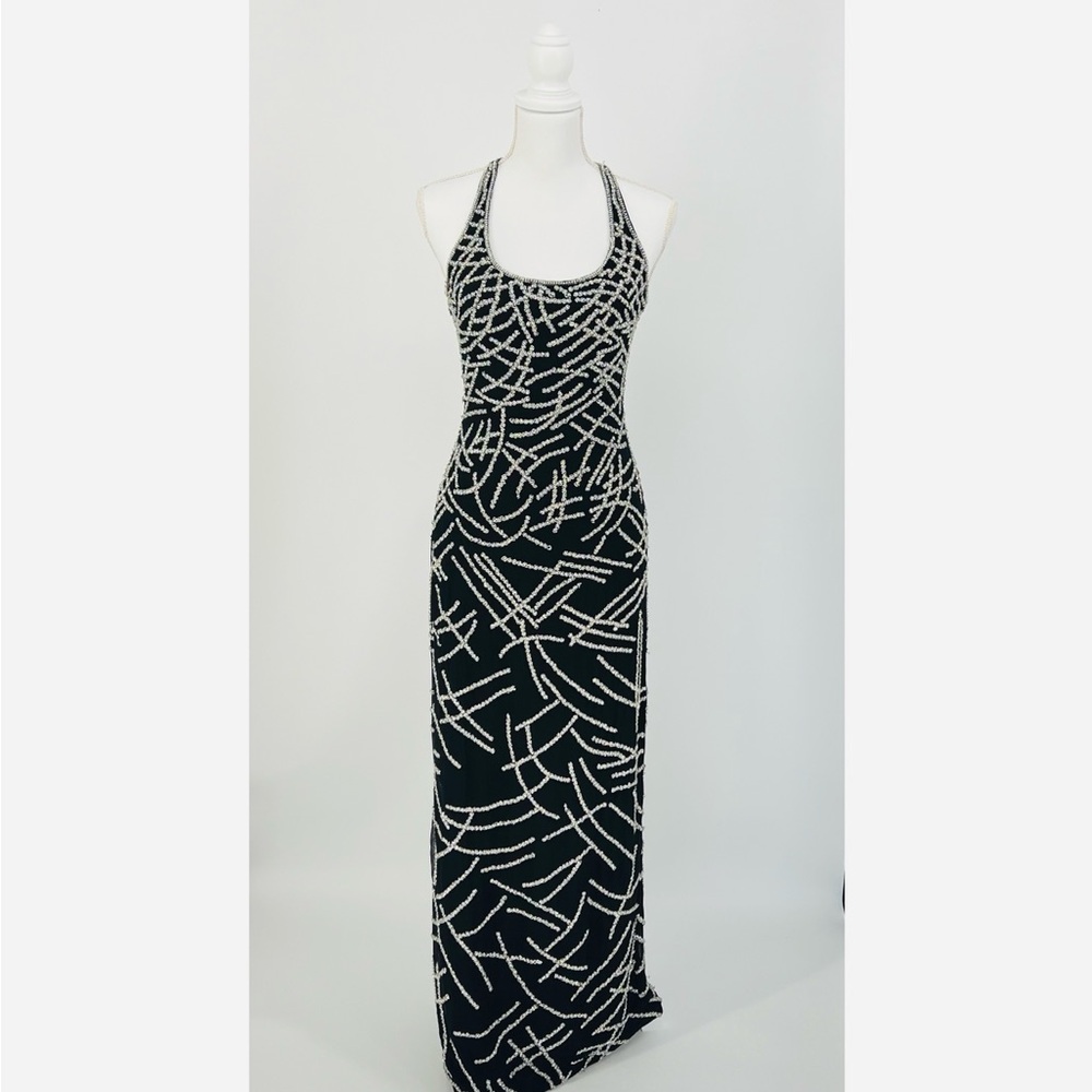 Beautiful preloved Cristal collection dress.Size M measurement B:34” W:28” L:57”
